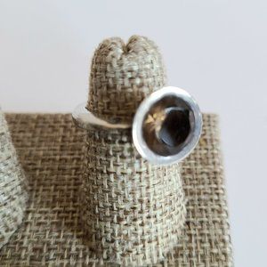 Sterling silver ring with round Smokey Quartz stone.